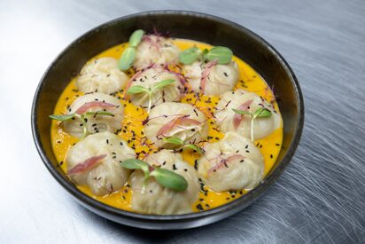 Calgary Momo House restaurant Calgary - Lowest Flight Fares Calgary Momo House restaurant Calgary